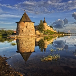 Fortress in Pskov with the reflection in the river (yulenochekk)