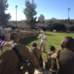 "An actor with the Western Wall Heritage Foundation speaking to the soldiers on their way to the Western Wall" (credit: Mitch Ginsburg/Times of Israel, 2012)