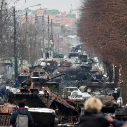 "Bucha. Faces of War. - Ukraine War Photo Exhibition 2023 (52703004165)" (credit: Houses of the Oireachtas, license: CC BY)